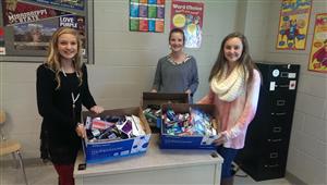 Sigma Members show off items that we collected for Tuscaloosa's Hope Buckets. 